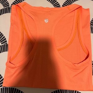 Orange swiftly tech lulu tank top